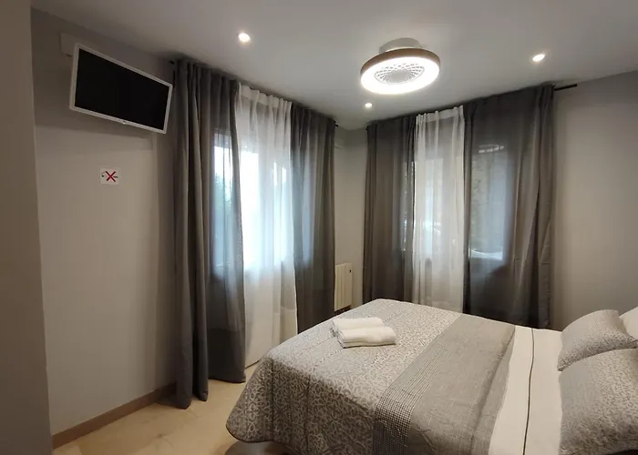 Con Hermosas Vistas A *